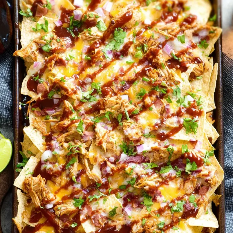 A pan of BBQ chicken nachos.