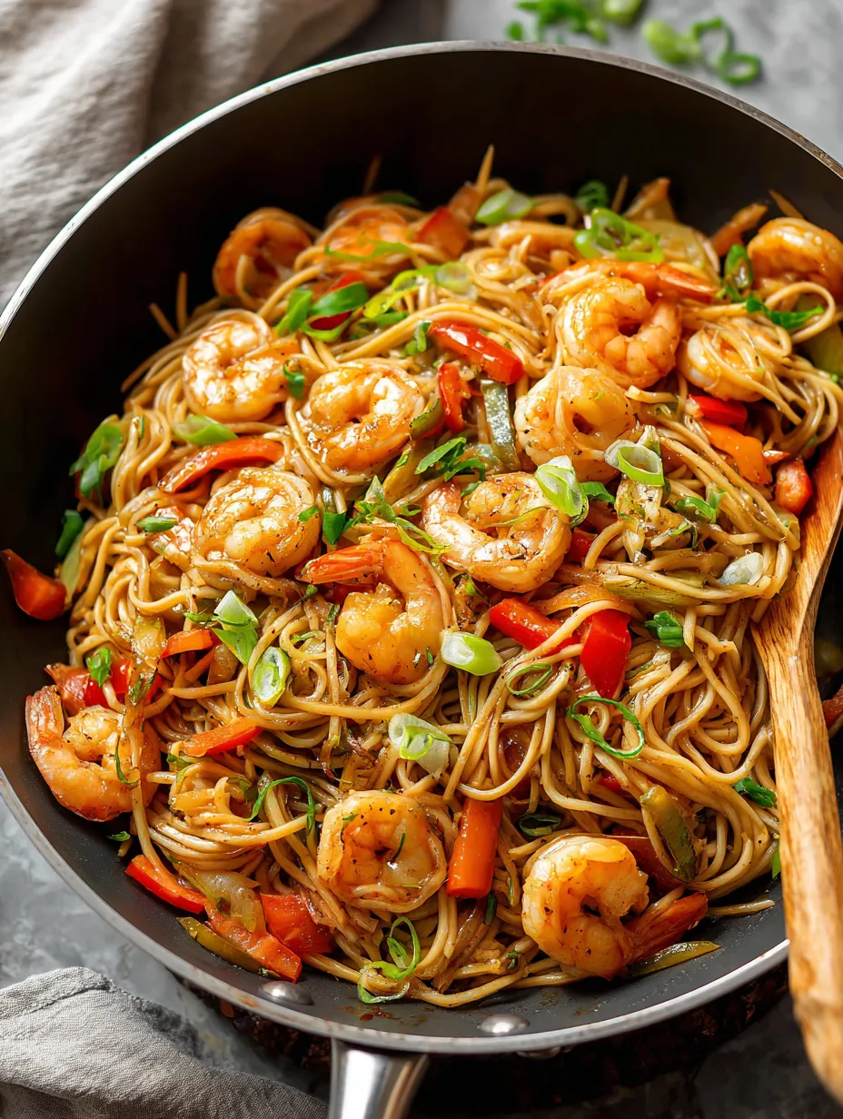 A bowl of shrimp and vegetables.