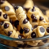 A bowl of chocolate chip dough twists.