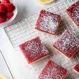 A tray of red squares with white powder on them.