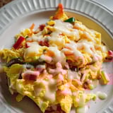 A plate of food with a fried egg on top.
