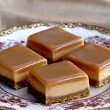 A plate of desserts with a gold trim.