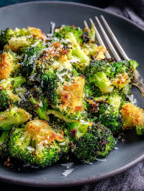 A plate of smashed broccoli.